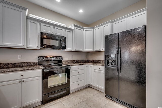 422 S Poplar Dr, Surfside Beach, SC 29575 - kitchen with black appliances, light tile patterned flooring, and recessed lighting