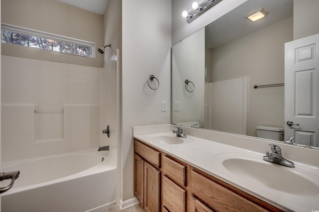 422 S Poplar Dr, Surfside Beach, SC 29575 - bathroom featuring toilet, double vanity, and washtub / shower combination
