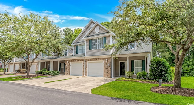 751 Painted Bunting Dr Unit E, Murrells Inlet, SC 29576 - view of property with concrete driveway, a garage, brick siding, a front yard, and a shingled roof