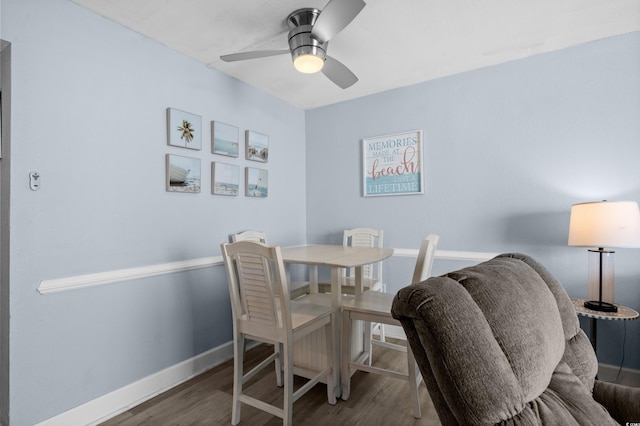 9550 Shore Dr Unit 529, Myrtle Beach, SC 29572 - dining room with wood finished floors, baseboards, and a ceiling fan