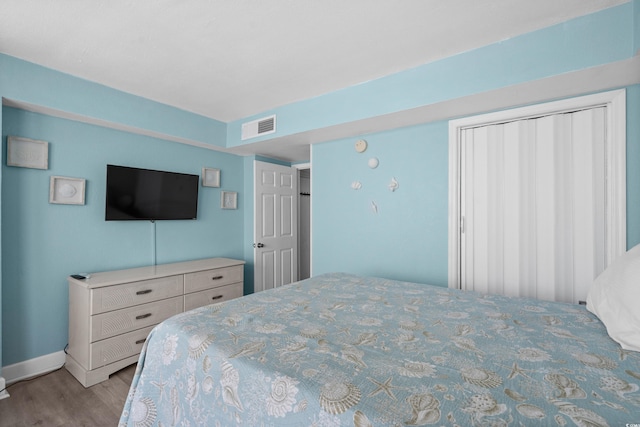 9550 Shore Dr Unit 529, Myrtle Beach, SC 29572 - bedroom with wood finished floors and baseboards