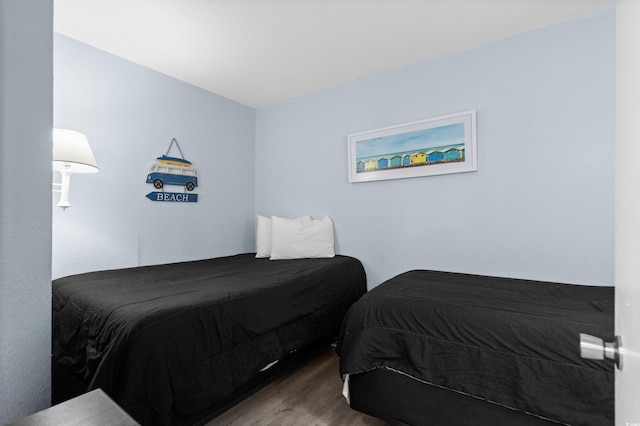 9550 Shore Dr Unit 529, Myrtle Beach, SC 29572 - bedroom featuring wood finished floors