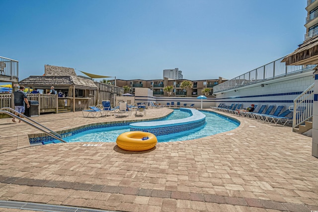 9550 Shore Dr Unit 529, Myrtle Beach, SC 29572 - community pool featuring a patio