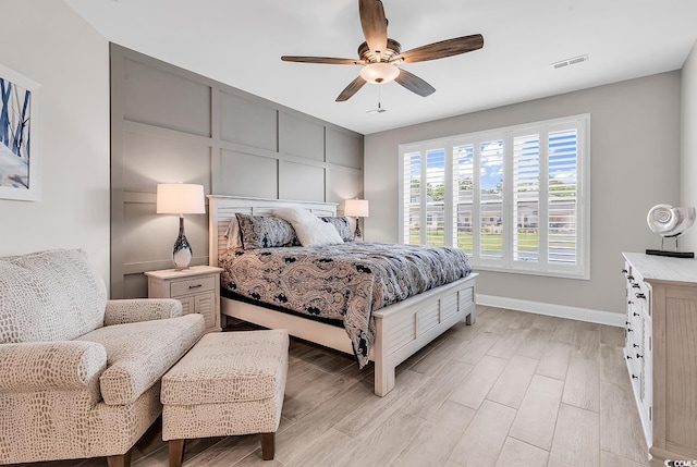 8469 Cape Dutch Loop, Myrtle Beach, SC 29572 - bedroom featuring baseboards, light wood-type flooring, and ceiling fan