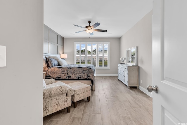 8469 Cape Dutch Loop, Myrtle Beach, SC 29572 - bedroom with light wood-style flooring, baseboards, and a ceiling fan