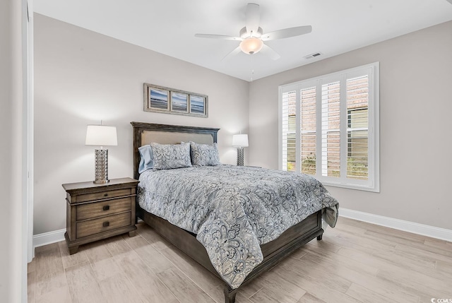 8469 Cape Dutch Loop, Myrtle Beach, SC 29572 - bedroom featuring baseboards, light wood-style flooring, and a ceiling fan