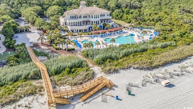 8469 Cape Dutch Loop, Myrtle Beach, SC 29572 - view from above of property featuring a pool area and a heavily wooded area