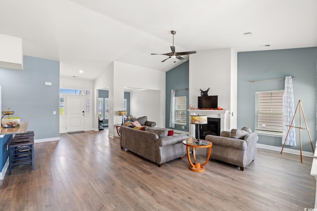 720 Little Fawn Way, Myrtle Beach, SC 29579 - living room with ceiling fan, wood finished floors, baseboards, a glass covered fireplace, and high vaulted ceiling
