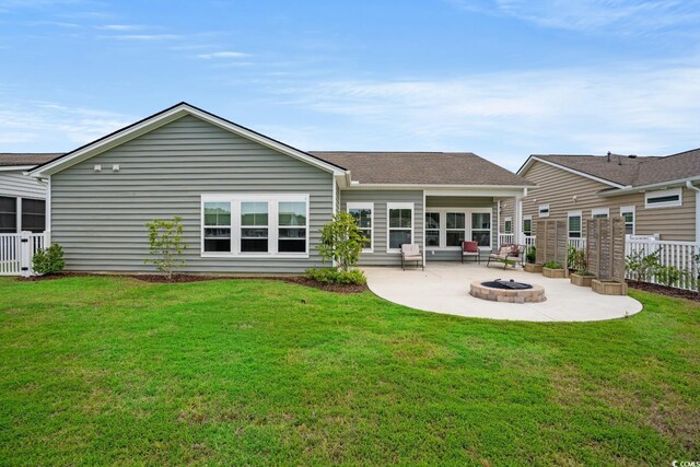 720 Little Fawn Way, Myrtle Beach, SC 29579 - rear view of house featuring an outdoor fire pit, a patio, and a shingled roof