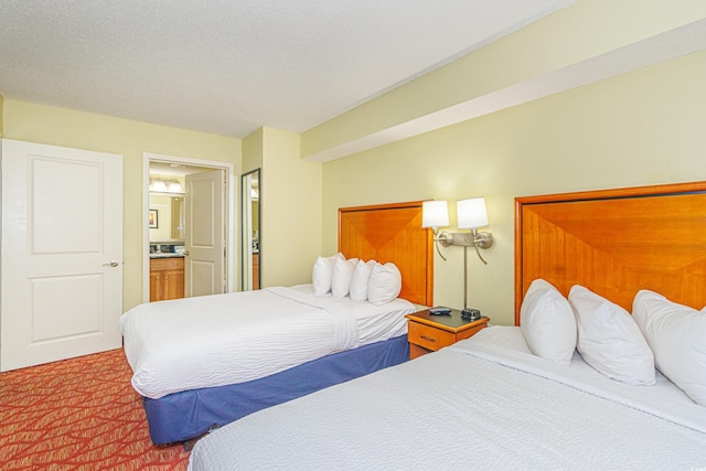 504 N Ocean Blvd Unit 1804A/B, Myrtle Beach, SC 29577 - carpeted bedroom with ensuite bath