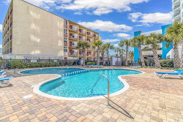 1605 S Ocean Blvd S Unit 105, Myrtle Beach, SC 29577 - community pool featuring a patio area
