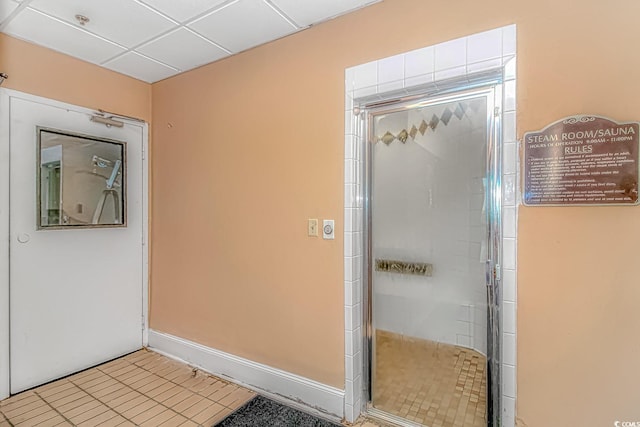 1605 S Ocean Blvd S Unit 105, Myrtle Beach, SC 29577 - bathroom featuring a shower stall and tile patterned flooring