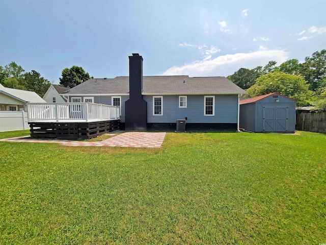 302 Silver Fox Trl, Myrtle Beach, SC 29588 - back of property with a patio, a wooden deck, cooling unit, and a chimney