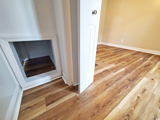 302 Silver Fox Trl, Myrtle Beach, SC 29588 - detailed view of wood finished floors and baseboards