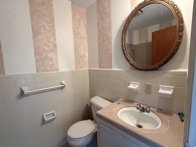 1002 S Beech Ave, Andrews, SC 29510 - bathroom with tile walls, toilet, vanity, and wainscoting
