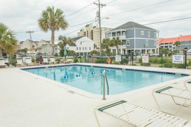 4516 Seaview St Unit 137, North Myrtle Beach, SC 29582 - community pool with a residential view and a patio area