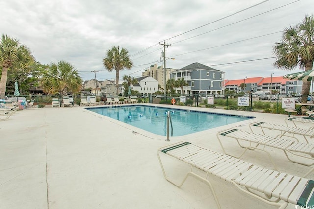 4516 Seaview St Unit 137, North Myrtle Beach, SC 29582 - community pool with a residential view and a patio area