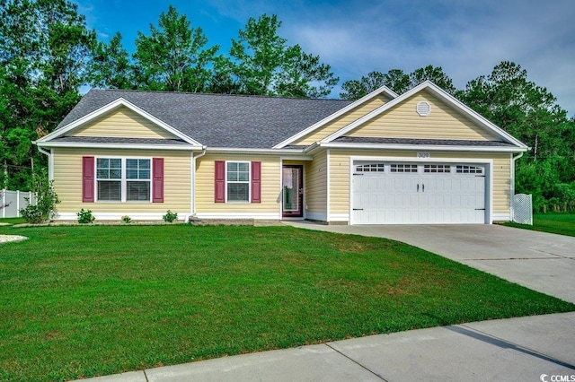 3129 Slade Dr, Conway, SC 29526 - ranch-style house with an attached garage, concrete driveway, a front yard, and a shingled roof