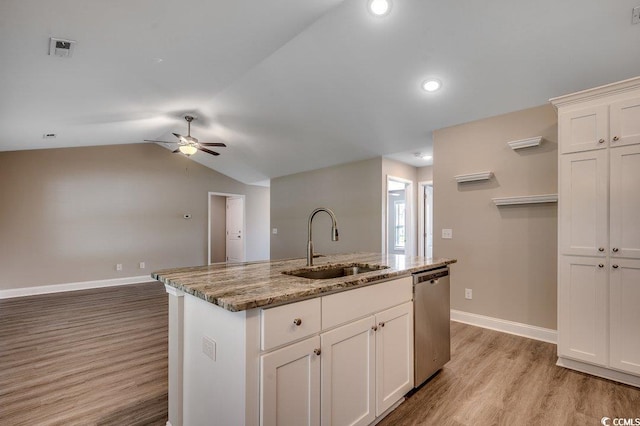 3129 Slade Dr, Conway, SC 29526 - kitchen featuring stainless steel dishwasher, a sink, light wood-style floors, a ceiling fan, and baseboards