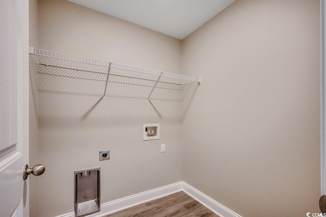 3129 Slade Dr, Conway, SC 29526 - laundry room featuring washer hookup, hookup for an electric dryer, baseboards, and wood finished floors