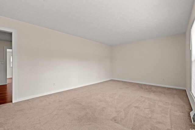 203 Longwood Ln, Conway, SC 29527 - spare room featuring carpet and baseboards