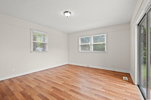 203 Longwood Ln, Conway, SC 29527 - spare room with light wood-style floors, healthy amount of natural light, and baseboards