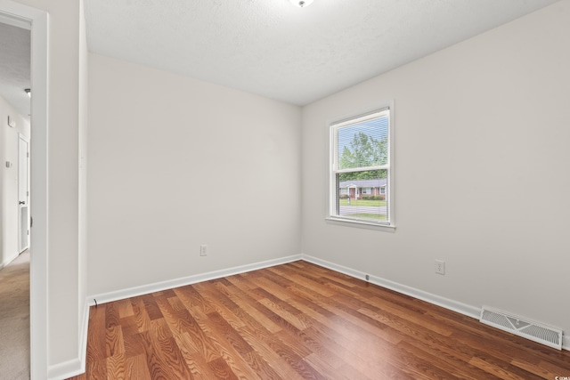 203 Longwood Ln, Conway, SC 29527 - spare room with baseboards and wood finished floors