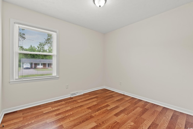 203 Longwood Ln, Conway, SC 29527 - empty room with wood finished floors and baseboards