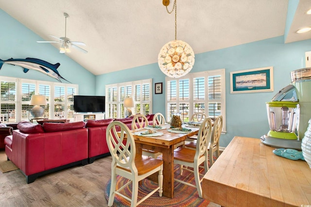 6 Indigo Ct, Ocean Isle Beach, NC 28469 - dining area with wood finished floors, lofted ceiling, ceiling fan, and a textured ceiling
