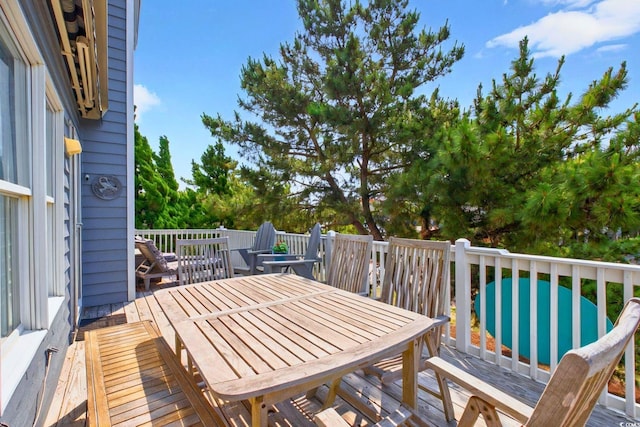6 Indigo Ct, Ocean Isle Beach, NC 28469 - wooden deck with outdoor dining space