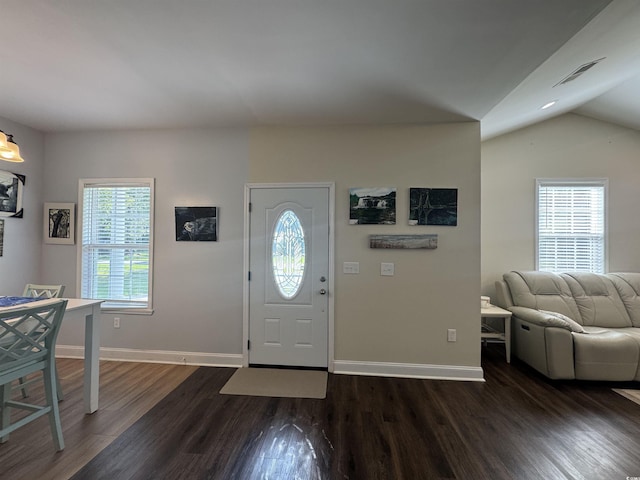 304 S Magnolia Ave, Andrews, SC 29510 - foyer featuring dark wood-style flooring, baseboards, and lofted ceiling