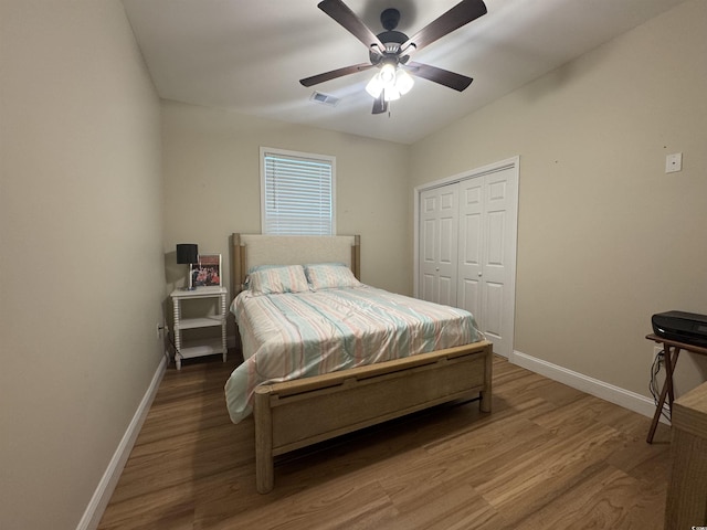 304 S Magnolia Ave, Andrews, SC 29510 - bedroom featuring baseboards, wood finished floors, a closet, and ceiling fan
