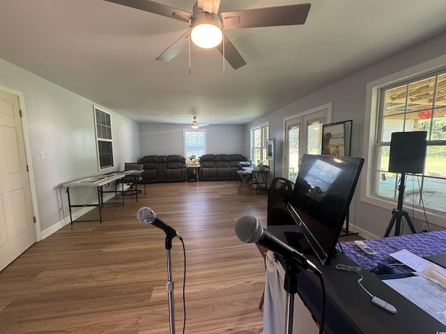 304 S Magnolia Ave, Andrews, SC 29510 - living area with wood finished floors, a ceiling fan, and baseboards