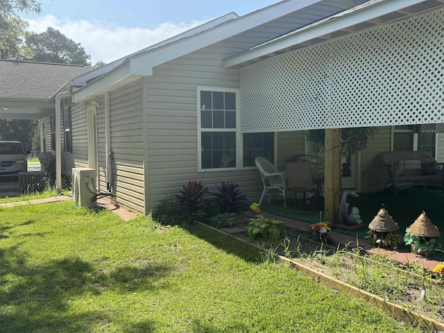 304 S Magnolia Ave, Andrews, SC 29510 - view of property exterior with a yard and a cooling unit