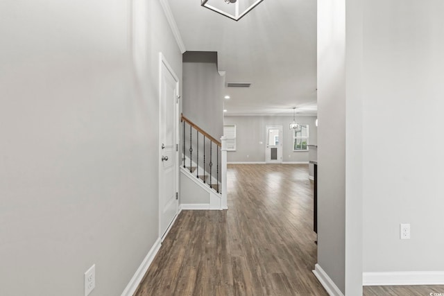 148 Long Leaf Pine Dr, Conway, SC 29526 - foyer entrance featuring wood finished floors, stairway, baseboards, a chandelier, and ornamental molding