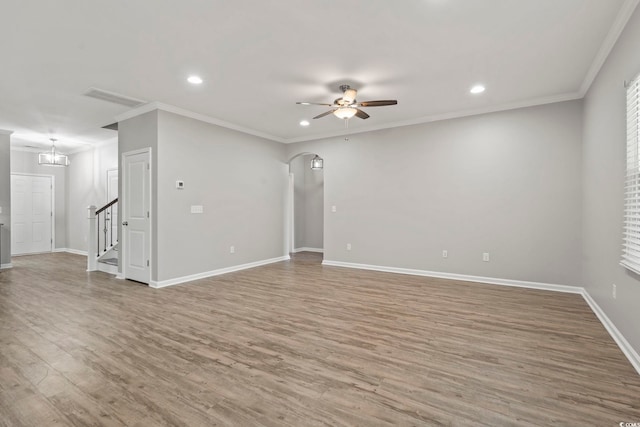 148 Long Leaf Pine Dr, Conway, SC 29526 - empty room with recessed lighting, ceiling fan, wood finished floors, arched walkways, and stairway
