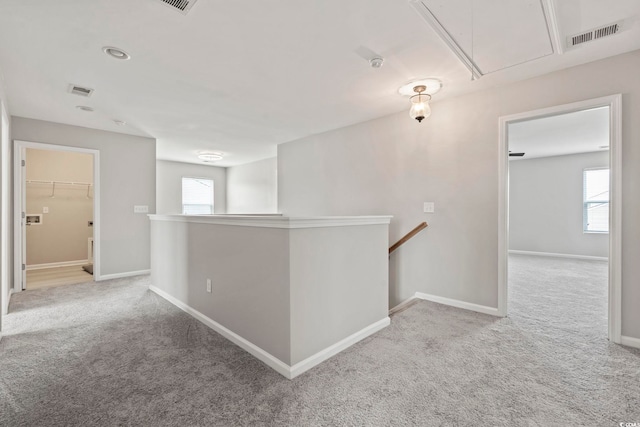 148 Long Leaf Pine Dr, Conway, SC 29526 - corridor featuring attic access, an upstairs landing, carpet, and baseboards