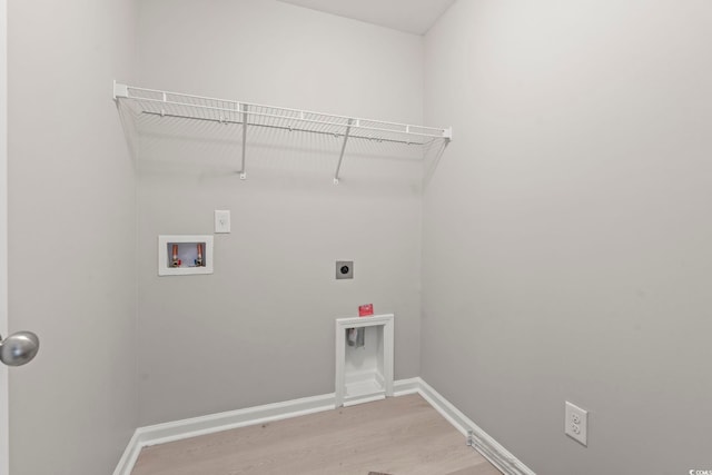 148 Long Leaf Pine Dr, Conway, SC 29526 - washroom with hookup for a washing machine, electric dryer hookup, light wood-style flooring, and baseboards