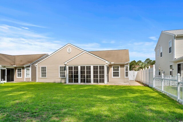 2448 Whetstone Ln, Myrtle Beach, SC 29579 - rear view of property with a sunroom