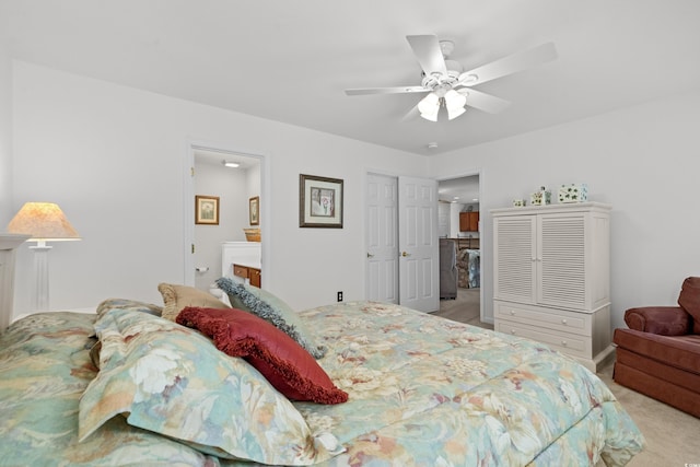 2448 Whetstone Ln, Myrtle Beach, SC 29579 - bedroom with light colored carpet, ceiling fan, and connected bathroom