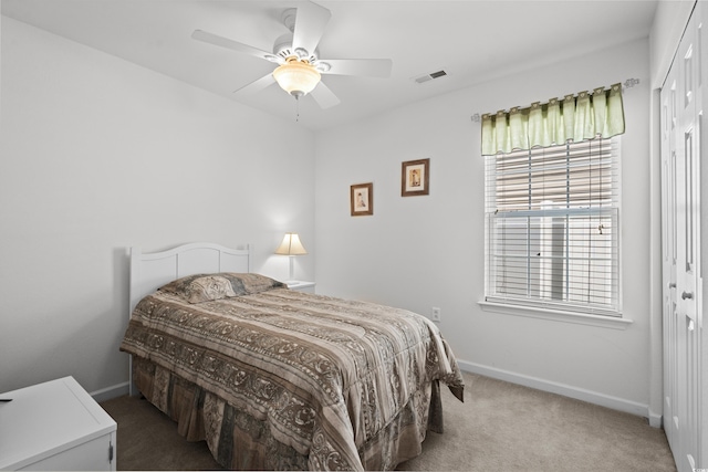 2448 Whetstone Ln, Myrtle Beach, SC 29579 - carpeted bedroom featuring baseboards, multiple windows, and a closet