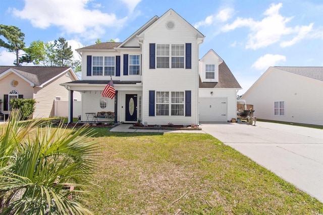 104 Clovis Cir, Myrtle Beach, SC 29579 - view of front facade featuring concrete driveway, a front lawn, and covered porch