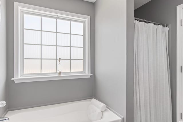 104 Clovis Cir, Myrtle Beach, SC 29579 - full bathroom featuring plenty of natural light, a garden tub, and a shower with curtain