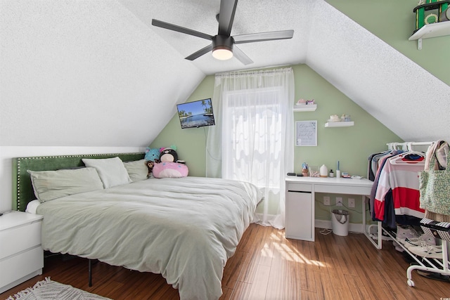 104 Clovis Cir, Myrtle Beach, SC 29579 - bedroom featuring a textured ceiling, wood finished floors, lofted ceiling, and ceiling fan
