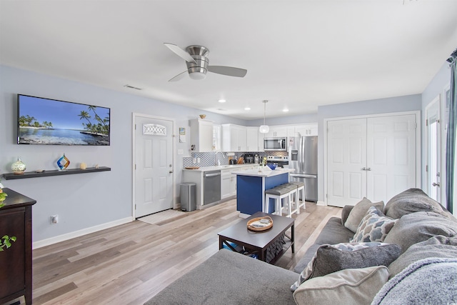 104 Clovis Cir, Myrtle Beach, SC 29579 - living room with ceiling fan, light wood finished floors, baseboards, and recessed lighting