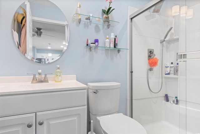 104 Clovis Cir, Myrtle Beach, SC 29579 - bathroom with a stall shower, toilet, vanity, and ceiling fan