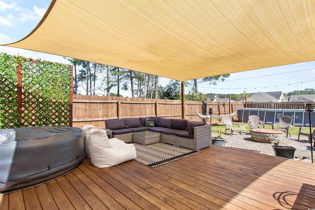 104 Clovis Cir, Myrtle Beach, SC 29579 - deck featuring an outdoor living space with a fire pit, a fenced backyard, and a patio area