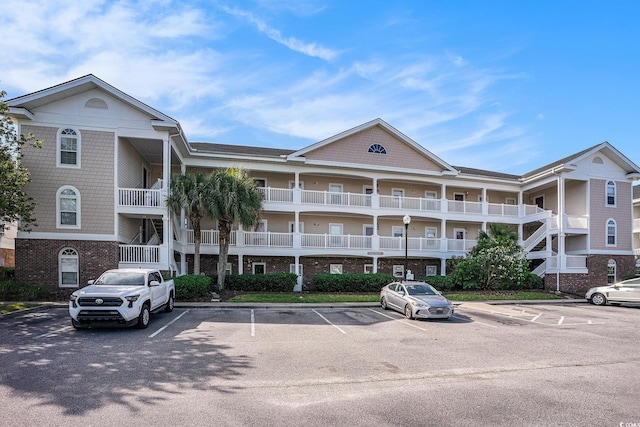 5751 Oyster Catcher Dr Unit 315, North Myrtle Beach, SC 29582 - view of property with uncovered parking