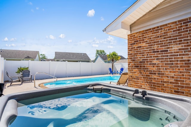 502 Garden Dr, Surfside Beach, SC 29575 - view of pool with a hot tub, a fenced backyard, and a patio area