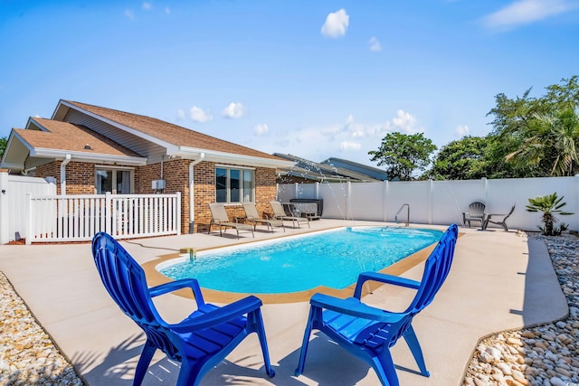 502 Garden Dr, Surfside Beach, SC 29575 - view of swimming pool featuring a patio area, a fenced backyard, and french doors